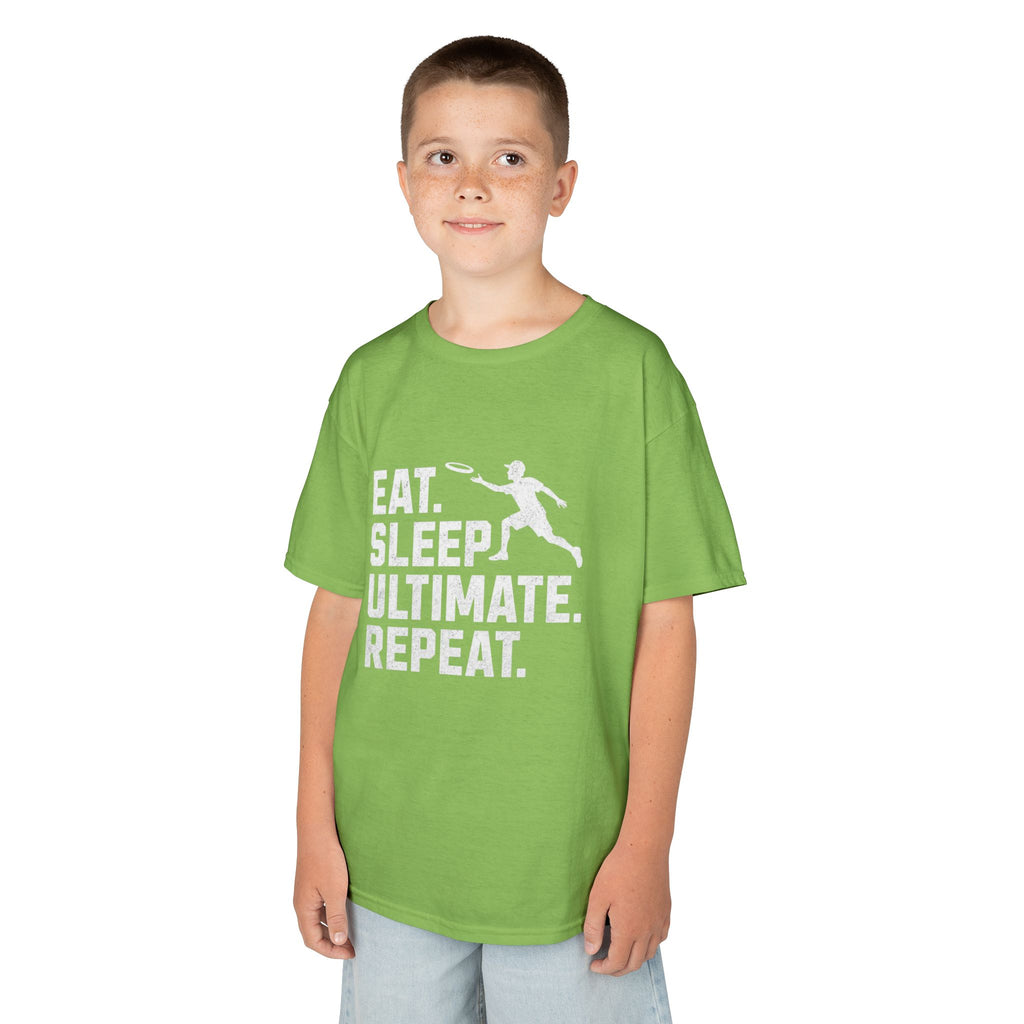 Child wearing a green t-shirt with 'Eat. Sleep. Ultimate. Repeat.' text and graphic on a white background