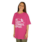 Young girl wearing a pink t-shirt with 'Eat. Sleep. Ultimate. Repeat.' text and graphic on a white background
