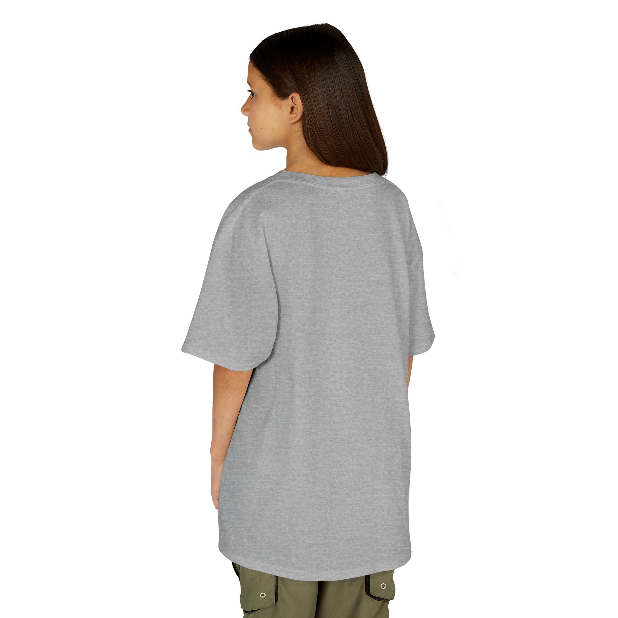 Person wearing a gray oversized t-shirt on a white background