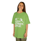 Child wearing a green t-shirt with 'Eat. Sleep. Ultimate. Repeat.' text and graphic on a white background