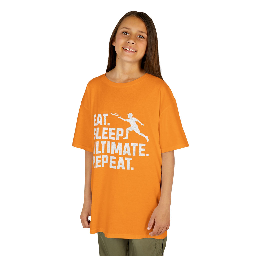 Child wearing an orange t-shirt with 'Eat. Sleep. Ultimate. Repeat.' text and graphic on a white background