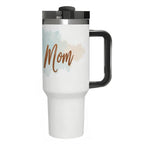 White travel mug with 'Swim Mom' text and floral design on a white background