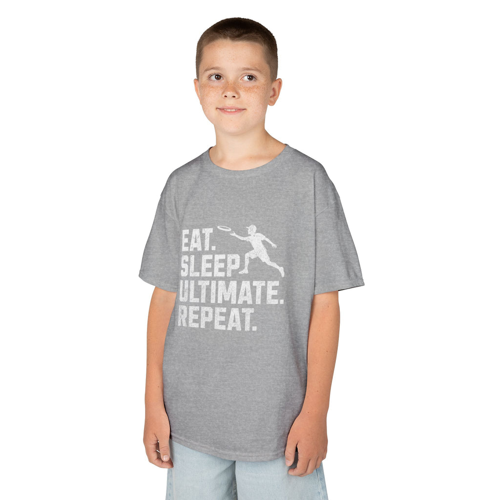 Child wearing a gray t-shirt with 'Eat. Sleep. Ultimate. Repeat.' text and graphic on a white background