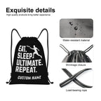 Black drawstring bag with text and water-resistant material feature on a white background