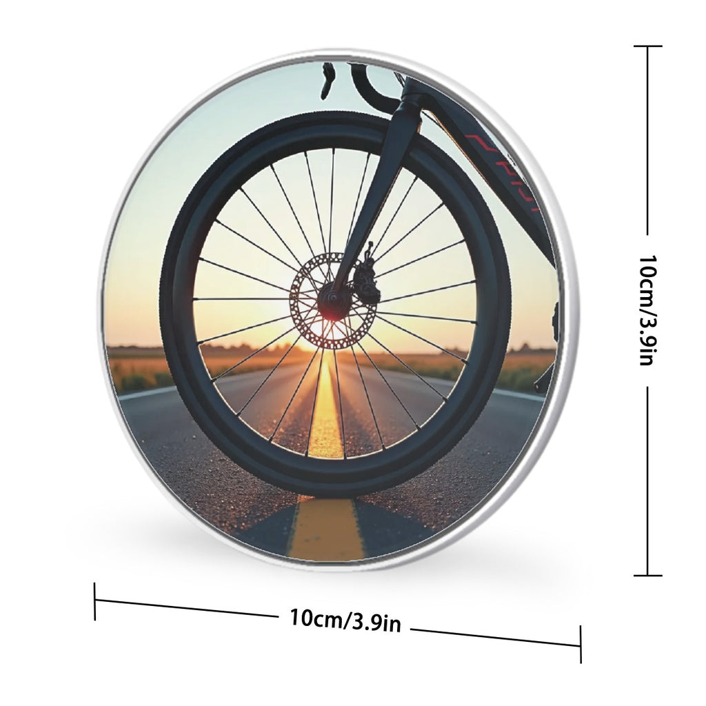 Bicycle wheel with a scenic road through spokes on a white background