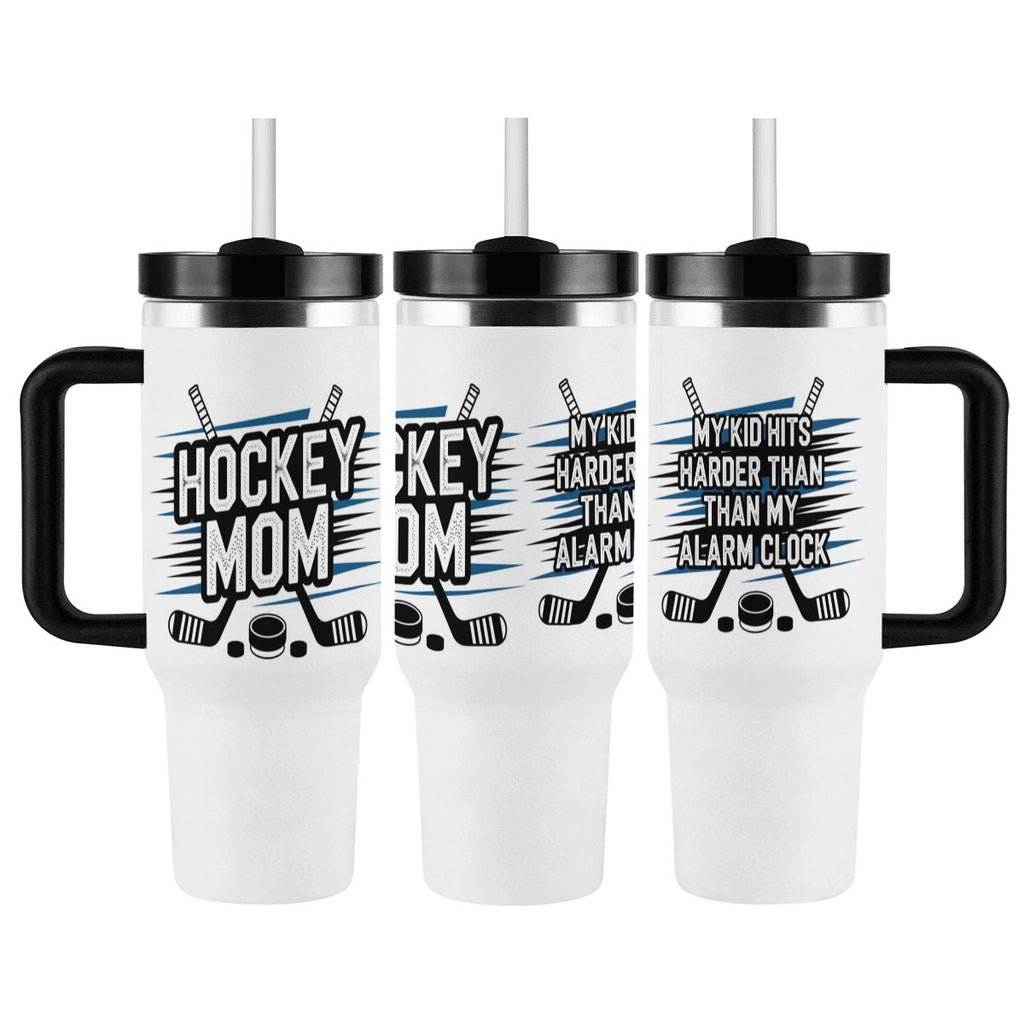 Three views of white tumbler with black handles and hockey-themed text that states "Hockey Mom" on front and "My Kid Hits Harder Than My Alarm Clock" on the back on a white background