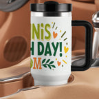 Travel mug with colorful "Tennis Match Day Mom" text and design on a brown leather surface