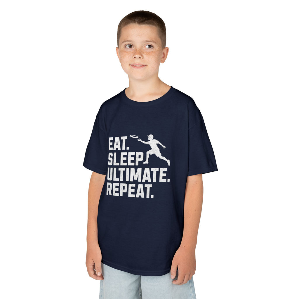 Child wearing a navy blue t-shirt with 'Eat. Sleep. Ultimate. Repeat.' text and graphic on a white background