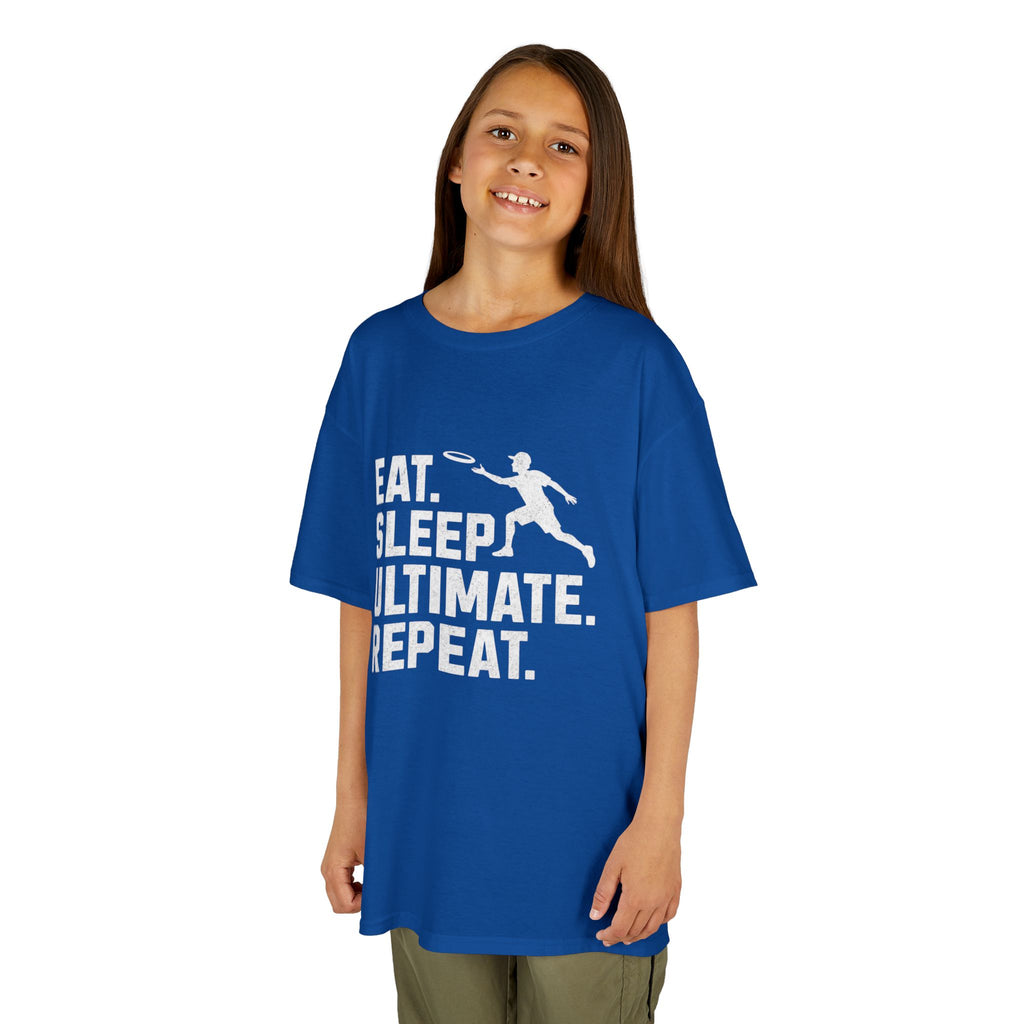 Child wearing a blue t-shirt with 'Eat. Sleep. Ultimate. Repeat.' text and graphic on a white background