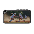 Bluetooth speaker with a design of lacrosse players running on a field