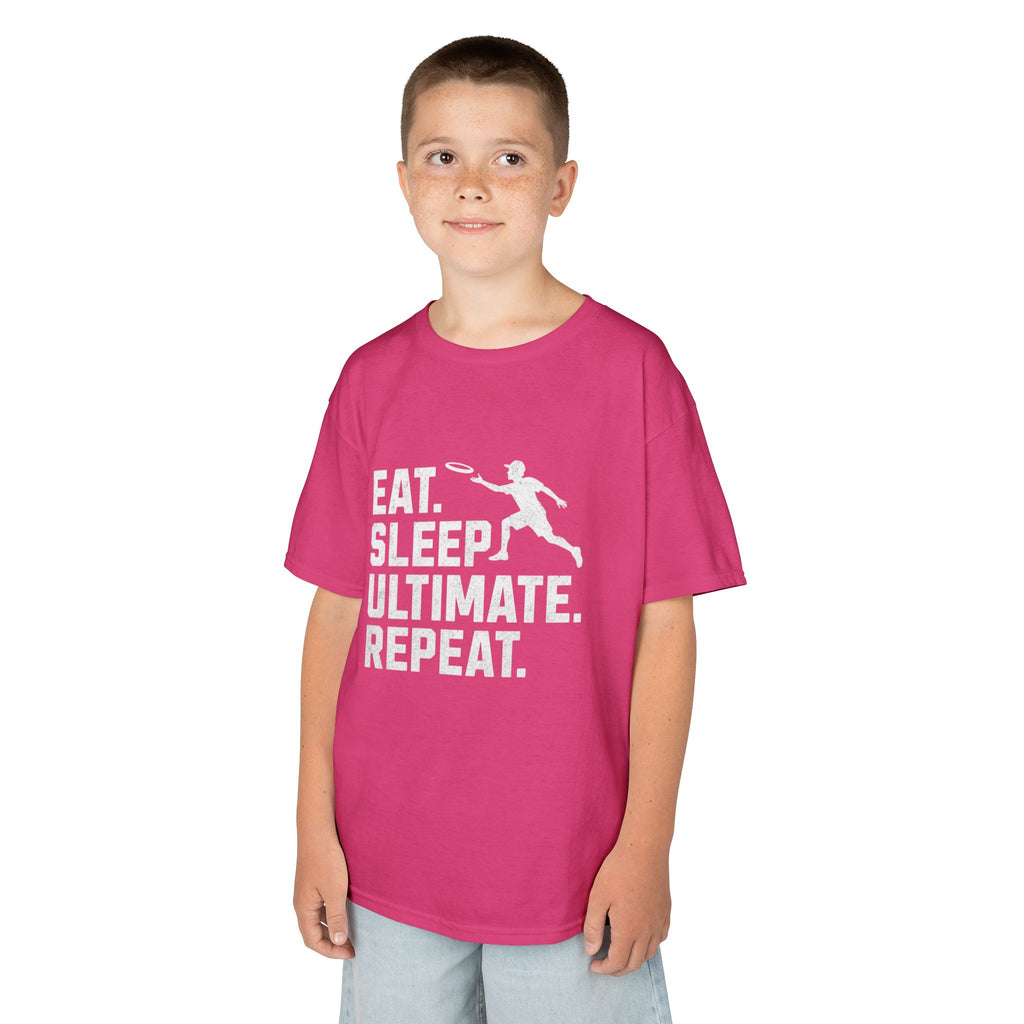Child wearing a pink t-shirt with 'Eat. Sleep. Ultimate. Repeat.' text and graphic on a white background