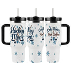 Three views of a travel mug with 'Hockey Mom' and 'Cold Rinks & Hot Coffee' designs on a neutral background with snowflakes.