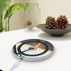 Wireless charger with bicycle design on a table with decorative items