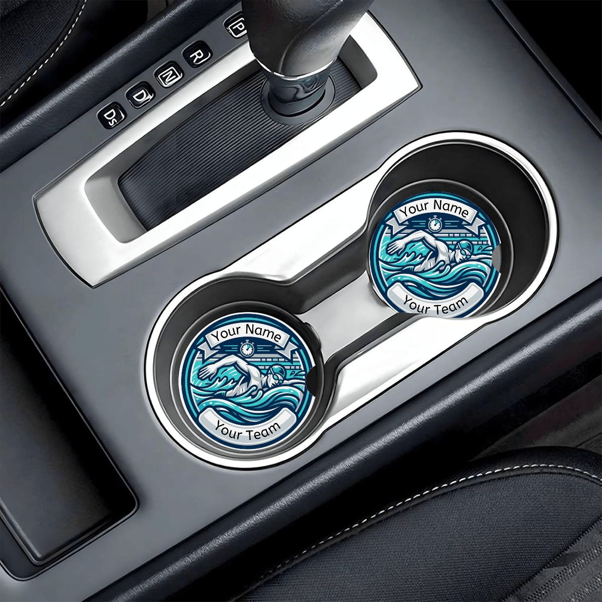 Two custom car coasters with a wave design and text placeholder on a car's gear shift tray.