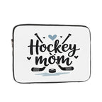 White laptop sleeve with 'Hockey Mom' text and hockey-related graphics on a white background