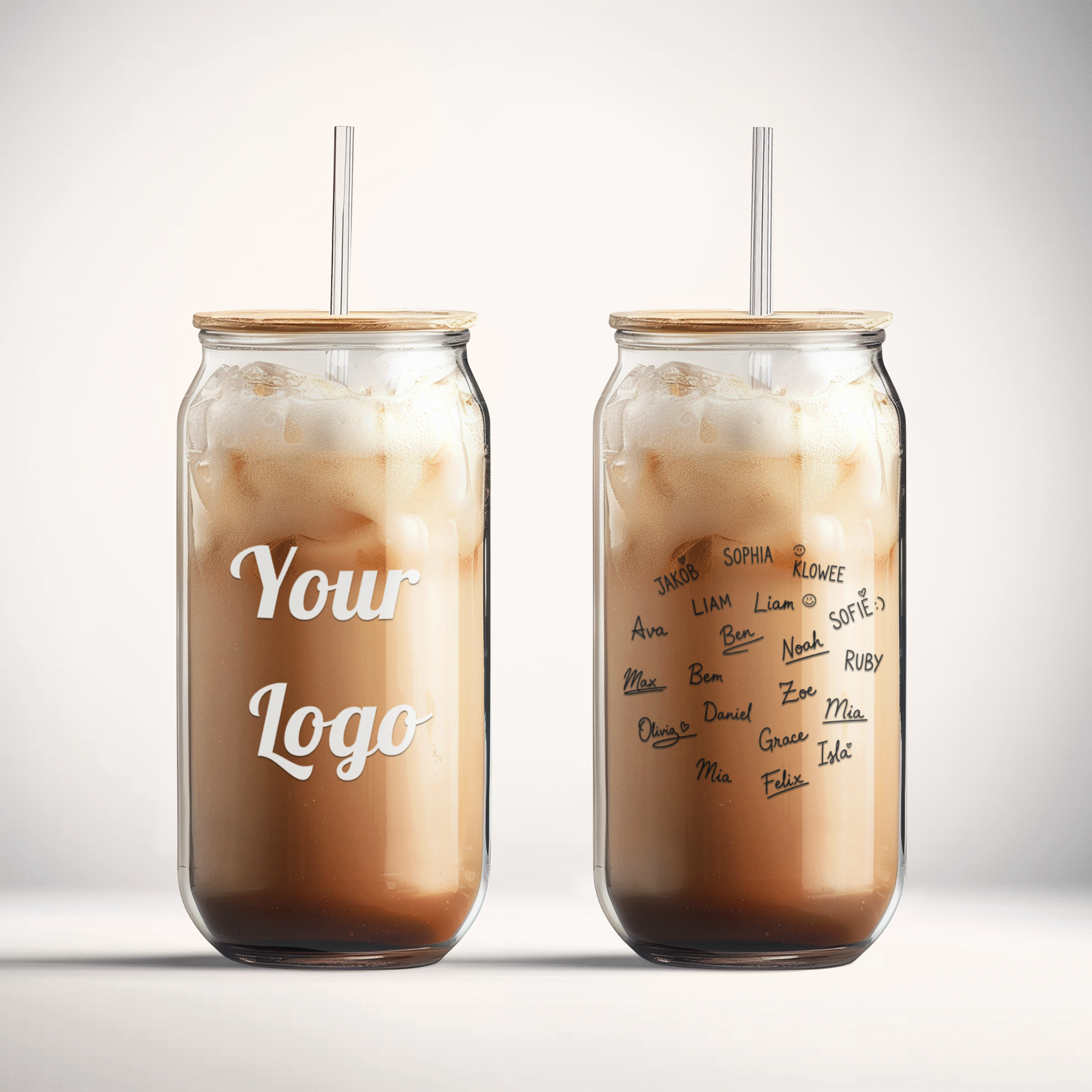 Two iced coffee cups with straws on a gray background