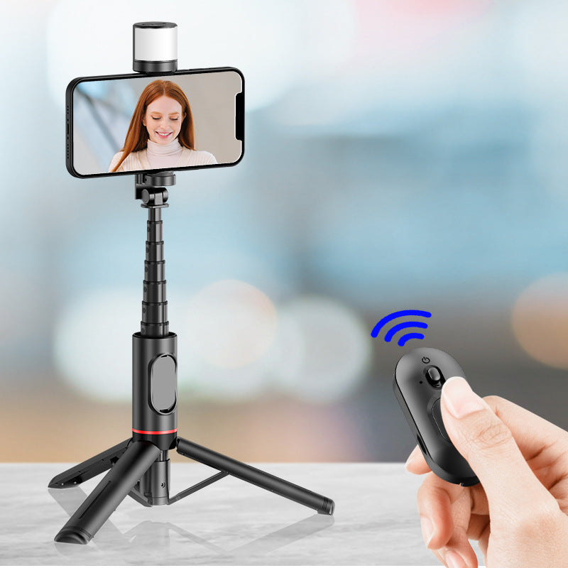 Phone holder with remote control on a blurred background