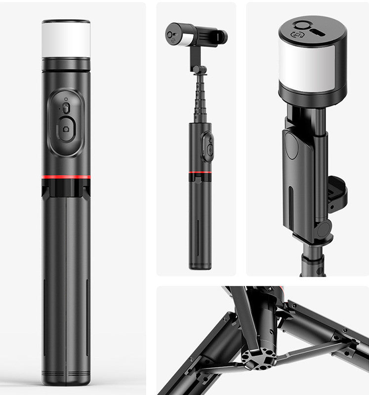 Black and silver camera tripod with multiple angles on a white background