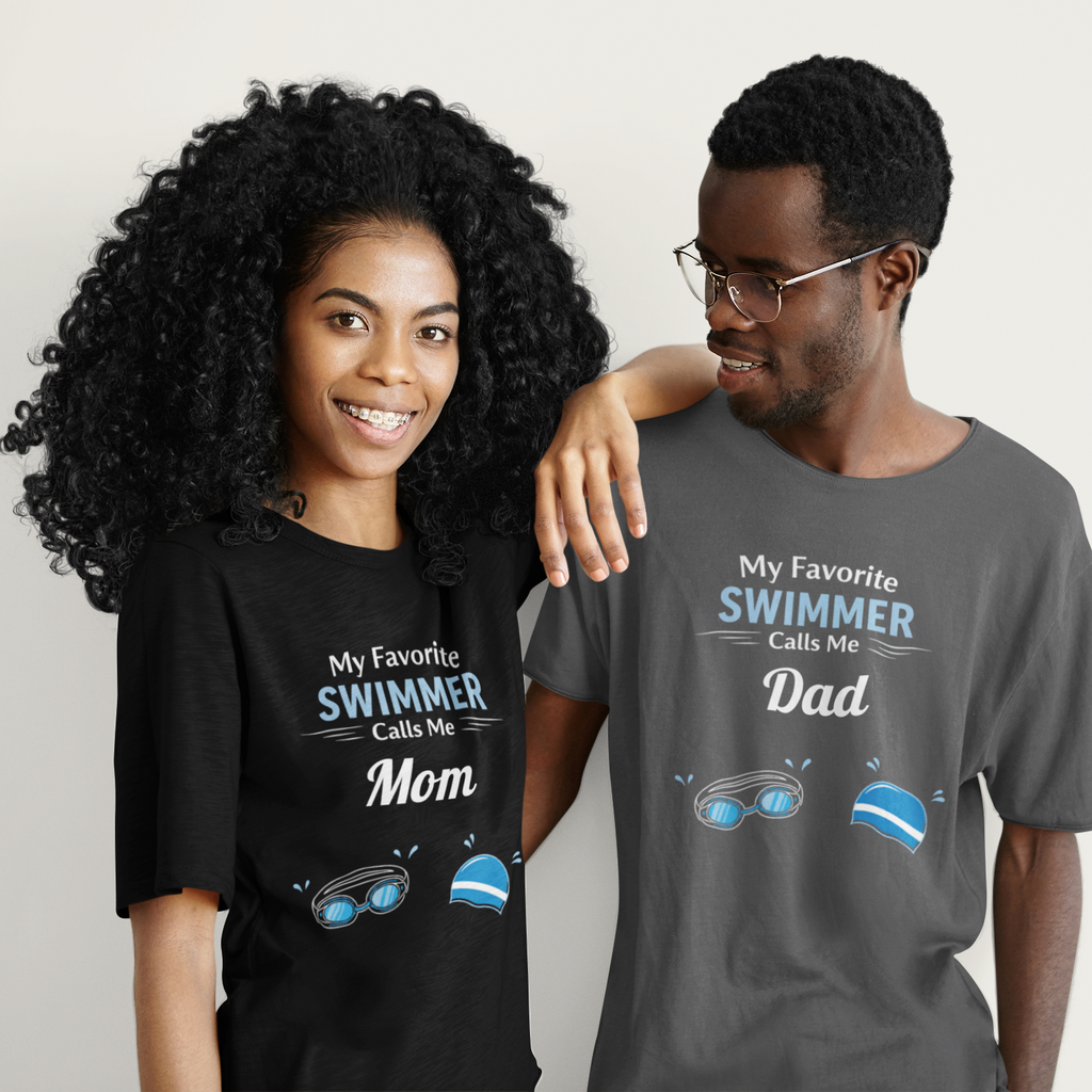 Two people wearing matching t-shirts with text about a swimmer and dad.